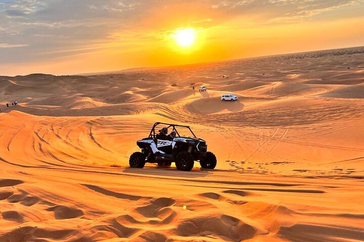 Desert Safari & Dune Bashing with tasty barbecue dinner and  captivating live shows